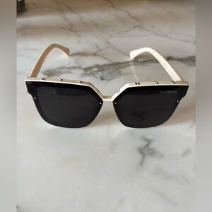 CHANEL Elegant Black and Cream Sunglasses
